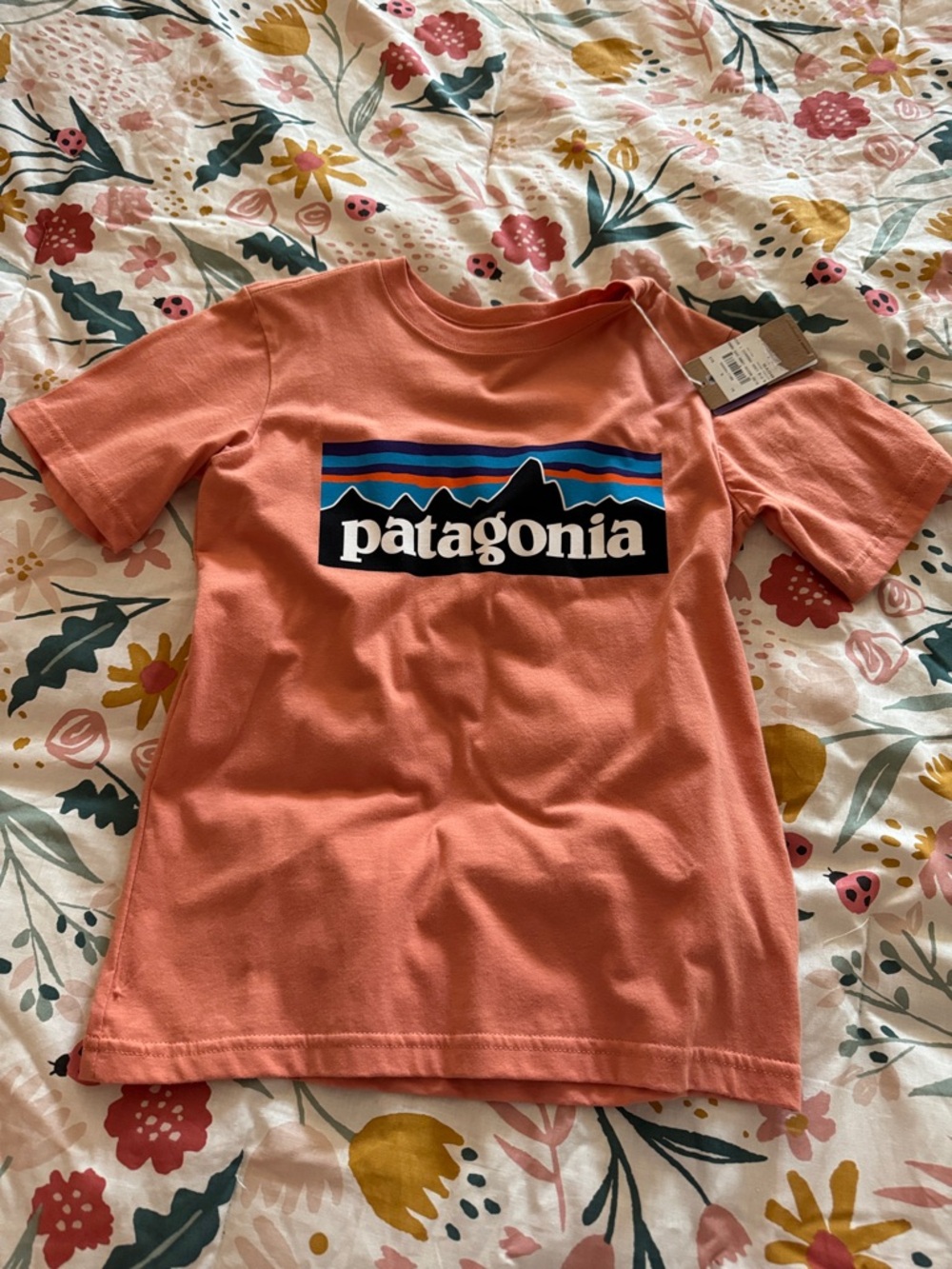 Patagonia Coral Tee with Blue and Black Logo